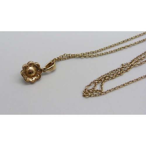 959 - A 9ct gold diamond and pearl pendant on a 9ct gold chain, 3.3g, chain 50cm