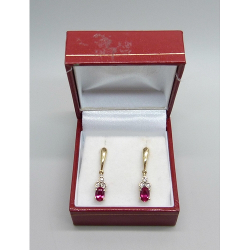 962 - A pair of 9ct gold ruby and diamond drop earrings, boxed, 2.1g