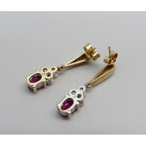 962 - A pair of 9ct gold ruby and diamond drop earrings, boxed, 2.1g