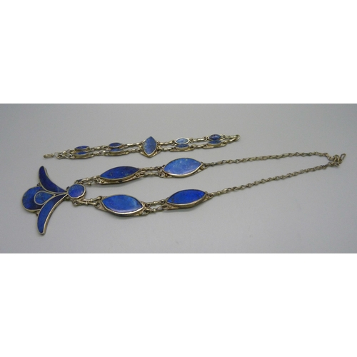 975 - A white metal necklace and bracelet set with lapis lazuli stone