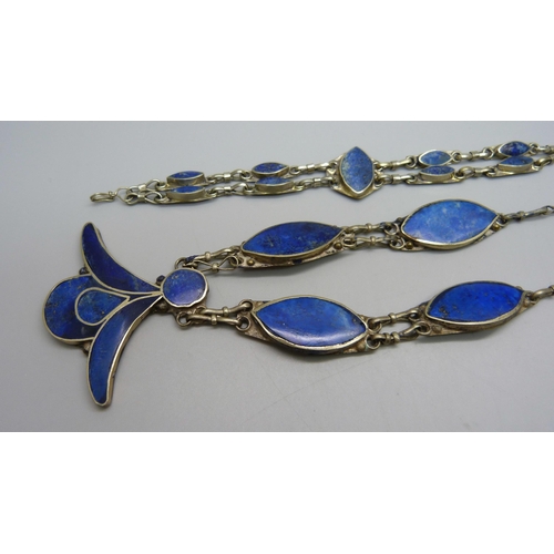 975 - A white metal necklace and bracelet set with lapis lazuli stone