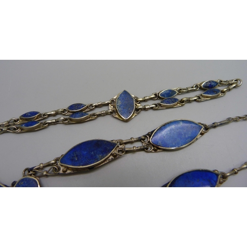 975 - A white metal necklace and bracelet set with lapis lazuli stone