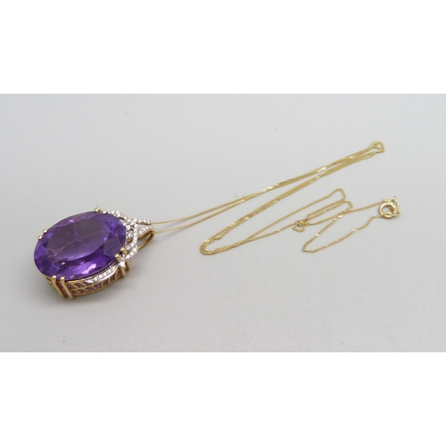 976 - An 18ct gold diamond and amethyst pendant on a fine 18ct gold chain, 9.6g, chain 44cm