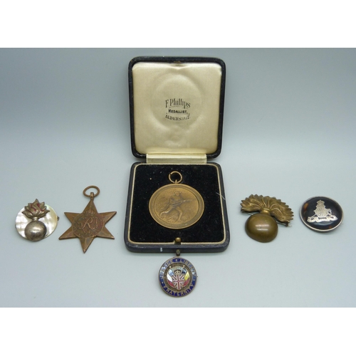 980 - A Sherwood Foresters medallion, a/f, a silver and tortoiseshell Royal Artillery badge