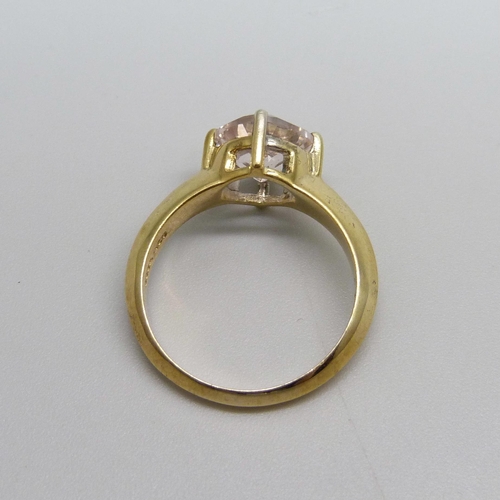 988 - A silver gilt pink topaz solitaire ring, P/Q