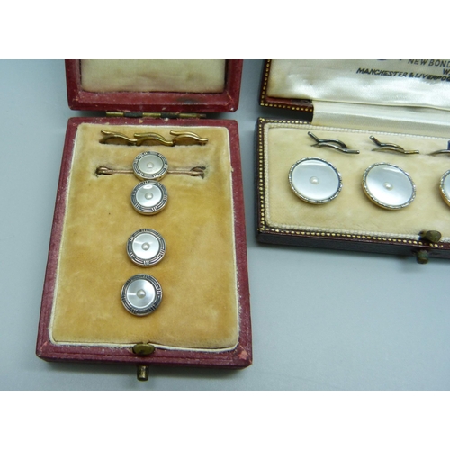 994 - A cased set of four 9ct gold and pearl buttons, 4.7g, and a set of three buttons