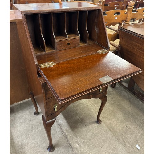 171 - A Queen Anne style walnut bureau de dame