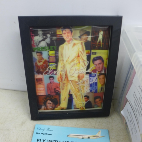 2054 - A quantity of Elvis Presley memorabilia including clocks, mugs, fridge magnets, books, magazines, sc... 
