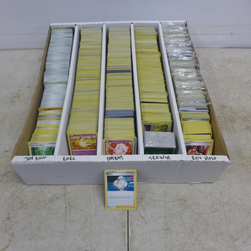 2077 - A large box of approx 6500 Pokémon cards plus tins, pokeballs, booklets and other items