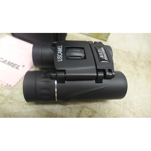 2083 - 10 Uscamel 8 x 21 compact binoculars - boxed, unused