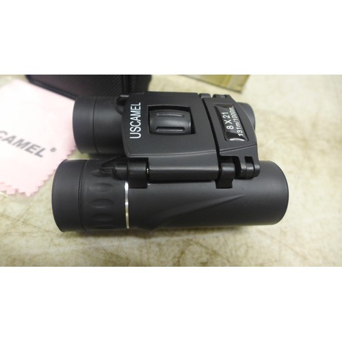 2084 - 10 Uscamel 8 x 21 compact binoculars - boxed, unused