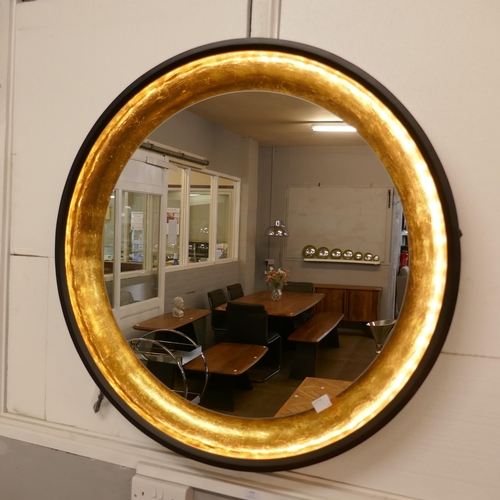 1336 - A large circular illuminated mirror