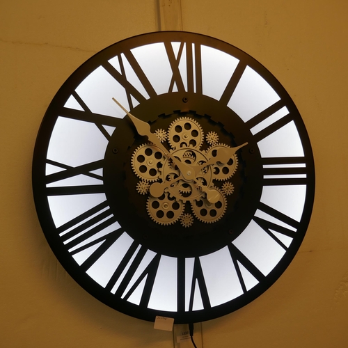 1337 - An illuminated moving gears wall clock