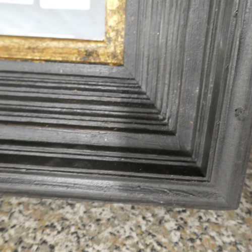 1428 - A black and gold square wall mirror