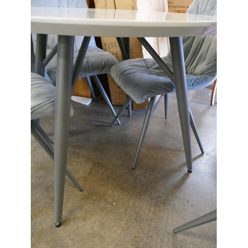 1491 - A Logan circular dining table and four Aran grey velvet chairs