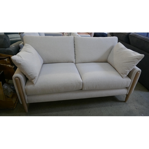 1502 - A linen upholstered three seater sofa RRP £1349