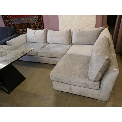 1510 - A silver velvet corner sofa