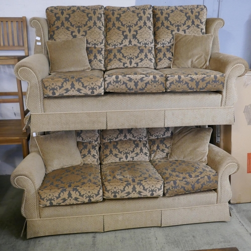 1521 - A gold floral upholstered three piece suite and a blue upholstered love seat - damaged