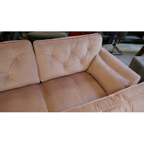 1545 - A pair of pink velvet Hoxton three seater sofas