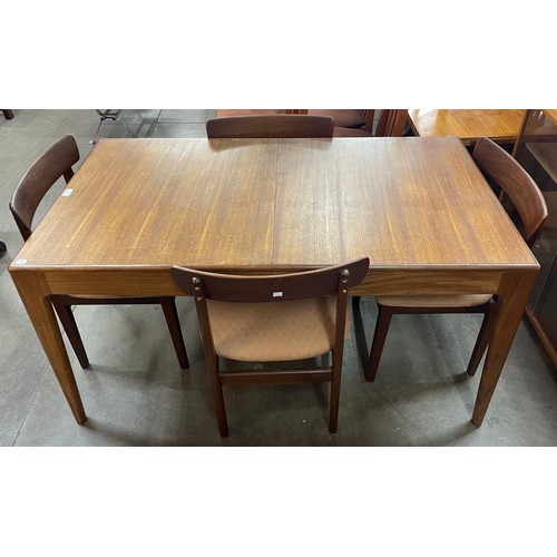 85 - A Younger Fonseca teak extending dining table and four chairs, designed by John Herbert