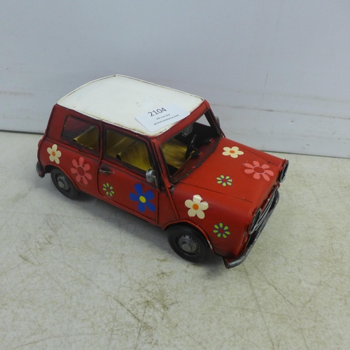 2104 - A tin plate model of a Mini