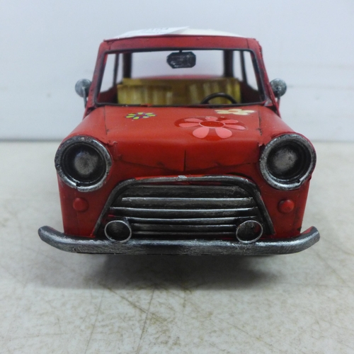 2104 - A tin plate model of a Mini