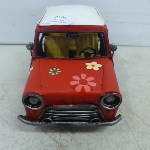 2104 - A tin plate model of a Mini
