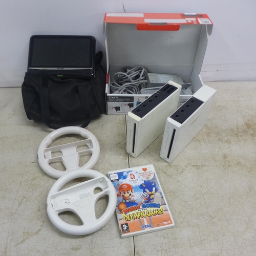 2115 - 2 Wii gaming consoles complete and an in car DVD player