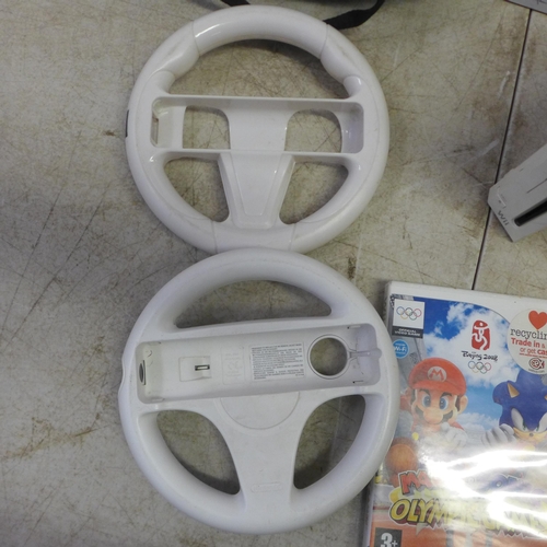 2115 - 2 Wii gaming consoles complete and an in car DVD player