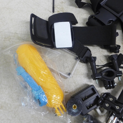 2117 - A Go Pro silver 7 HD Action Camera with harness strap, telescopic mono-pod, shock proof protective c... 