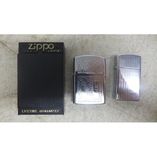 2125 - A Model 1615 slim Zippo lighter and a Hadson Zippo style lighter