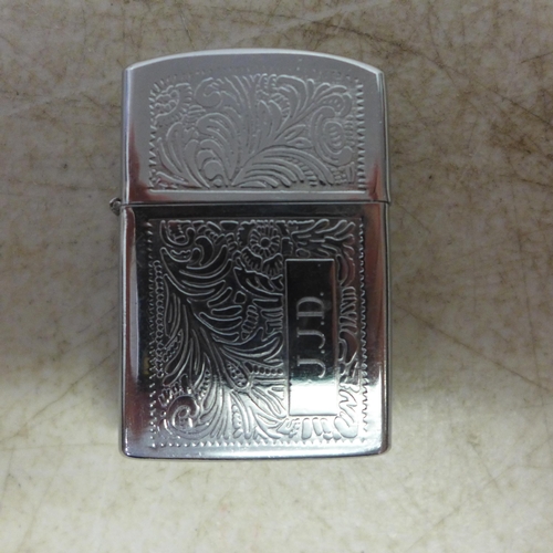 2125 - A Model 1615 slim Zippo lighter and a Hadson Zippo style lighter