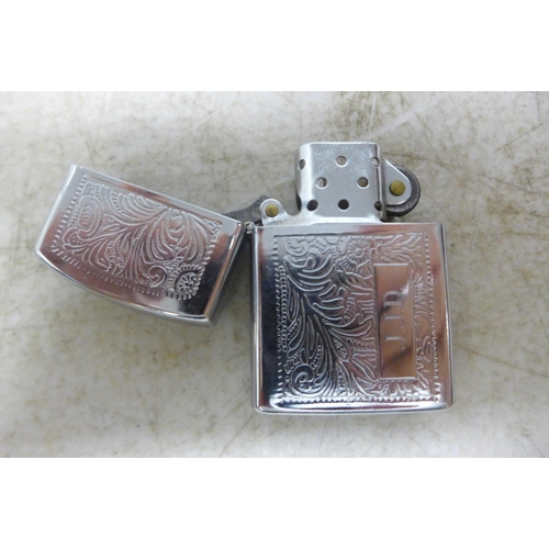 2125 - A Model 1615 slim Zippo lighter and a Hadson Zippo style lighter