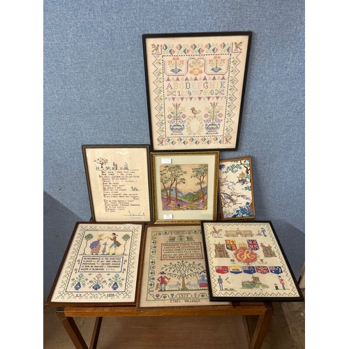 316 - Seven early 20th Century framed needleworks and samplers, two dated 1928 and 1936