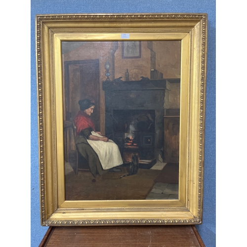 325 - J. Fontaine, portrait of a lady by a fire, oil on canvas, dated 1895, framed