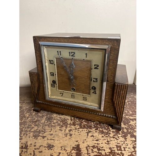 328 - An Art Deco oak mantle clock