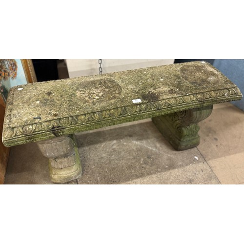 296 - A concrete garden bench