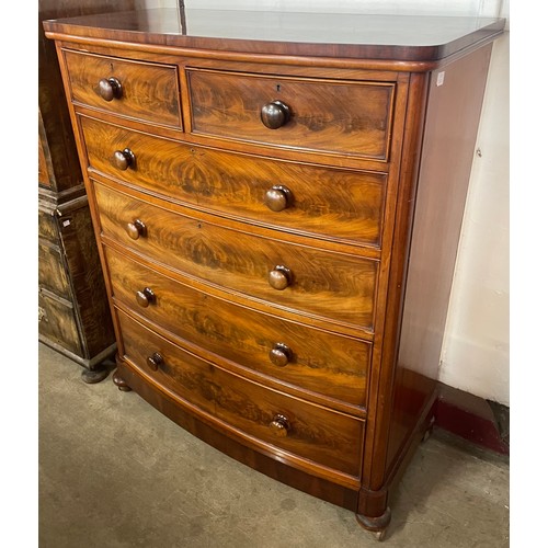 104 - A Victorian mahogany bow front chest of drawers