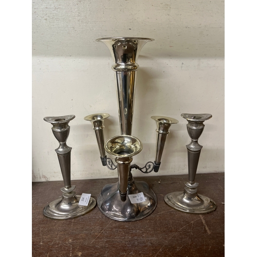 334 - A plated epergne and a pair of candlesticks