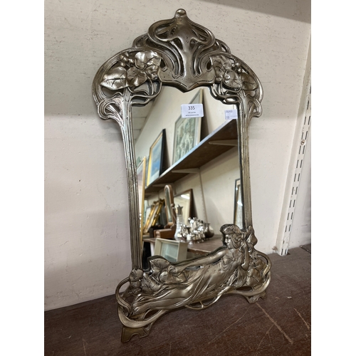 335 - An Art Nouveau style strut mirror