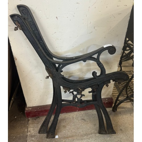 273 - A pair of cast metal bench ends