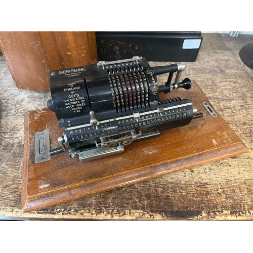 347 - An early 20th Century cased Brittanic adding machine