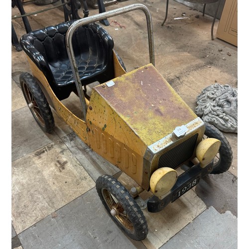 278 - A vintage child's toy pedal car