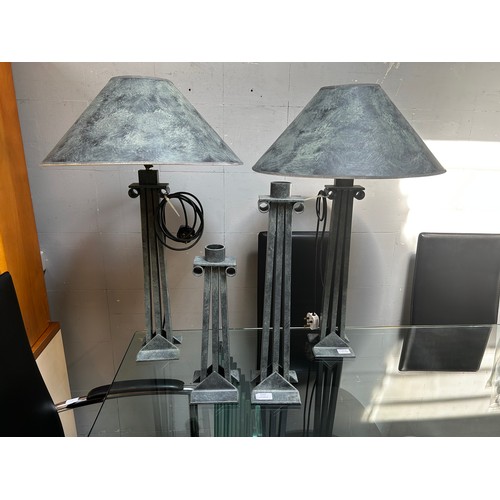 1537 - A pair of copper effect lamps and a pair of copper effect candlesticks