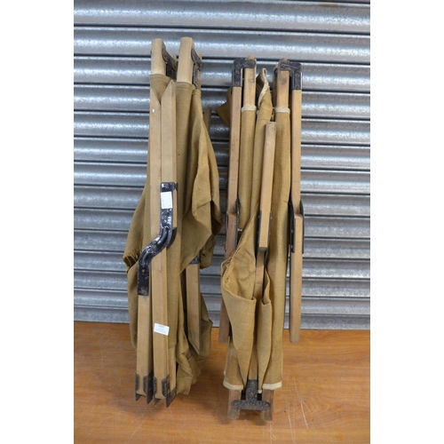 2237 - Two military surplus folding camping beds