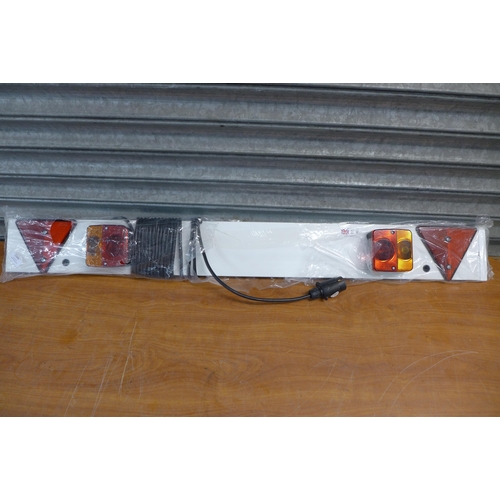 2260 - A set of Laser low level entry ramps and 4ft trailer board