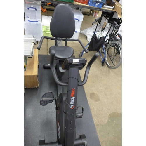 2275 - A Bodymax R860 seated exercise bike with floor mat