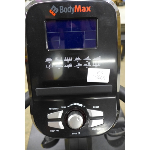 2275 - A Bodymax R860 seated exercise bike with floor mat