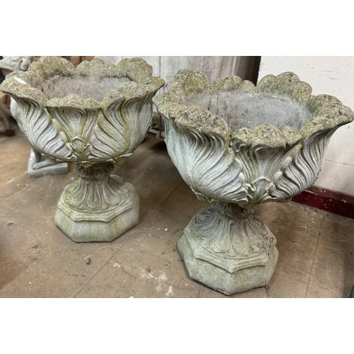 285 - A pair of large concrete garden urns