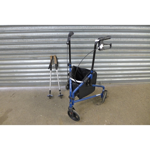 2294 - A 3 wheel mobility walker and a pair of Summit hiking sticks